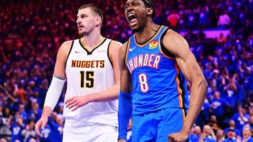 Jalen Williams grita después de realizar un mate ante un impotente Nikola Jokic.