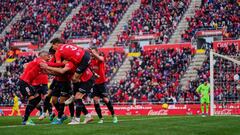 MALLORCA, SPAIN - FEBRUARY 05: Vedat Muriqi of RCD Mallorca  celebrates scoring his team&#039;s second goal with teammates during the LaLiga Santander match between RCD Mallorca and Cadiz CF at Estadio de Son Moix on February 05, 2022 in Mallorca, Spain. 