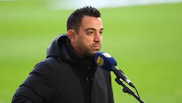 Soccer Football - Europa League - Quarter Final - First Leg - Eintracht Frankfurt v FC Barcelona - Deutsche Bank Park, Frankfurt, Germany - April 7, 2022 FC Barcelona coach Xavi during an interview before the match REUTERS/Kai Pfaffenbach