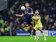 Andre-Pierre Gignac (L) of Tigres fights for the ball with Sebastian Caceres (R) of America during the final second leg match between Club America and Tigres UANL as part of Torneo Apertura 2023 Liga BBVA MX, at Azteca Stadium, December 17, 2023, in Mexico City, Mexico.