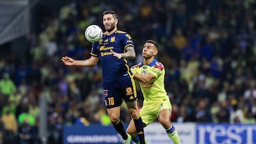 Andre-Pierre Gignac (L) of Tigres fights for the ball with Sebastian Caceres (R) of America during the final second leg match between Club America and Tigres UANL as part of Torneo Apertura 2023 Liga BBVA MX, at Azteca Stadium, December 17, 2023, in Mexico City, Mexico.