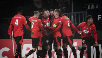 Rennes' French forward #07 Martin Terrier celebrates with teammates after scoring his team's first goal during the French Cup round of 32 football match between Stade Rennais and Olympique de Marseille (OM) at the Roazhon Park stadium in Rennes on January 21, 2024. (Photo by LOIC VENANCE / AFP)