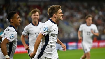 Soccer Football - UEFA Under 21 Championship - Quarter Final - England v Spain - Anton Malatinsky Stadium, Trnava, Slovakia - June 21, 2025 England's James McAtee celebrates scoring their first goal with Omari Hutchinson and Jack Hinshelwood REUTERS/Radovan Stoklasa