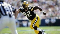 GREEN BAY, WI - CIRCA 1990s:  Reggie White #92 of the Green Bay Packers rushes against the St. Louis Rams during a mid circa 1990&#039;s NFL football game at Lambeau Field in Green Bay Wisconsin. White played for the Packers from 1993-98. (Photo by Focus on Sport/Getty Images)