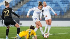 MADRID, SPAIN - DECEMBER 16: Babett Peter of Real Madrid scores their side&#039;s first goal past Maria Svidunovich of WFC Zhytlobud-1 Kharkiv during the UEFA Women&#039;s Champions League group B match between Real Madrid and WFC Zhytlobud-1 Kharkiv at E