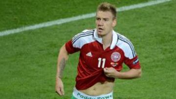 Danish forward Nicklas Bendtner celebrates after scoring during the Euro 2012 championships football match Denmark vs Portugal on June 13, 2012 at the Arena Lviv. AFP PHOTO / ANNE-CHRISTINE POUJOULAT