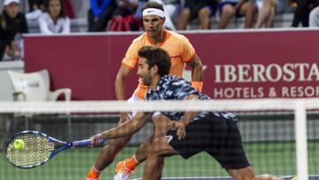 Rafa Nadal junto a Marc L&oacute;pez durante el primer partido de dobles del Campeonato de Espa&ntilde;a de Tenis Absoluto 2016.