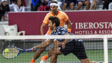 Rafa Nadal junto a Marc López durante el primer partido de dobles del Campeonato de España de Tenis Absoluto 2016.