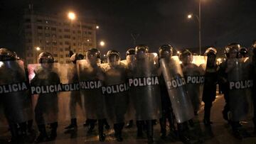 LIMA, PERU - DECEMBER 15: Security forces take measures against the protesters that gather for the eighth day of protests for demanding the dissolution of the Congress of the Republic, advancement of democratic elections and the resignation of President Dina Boluarte in Lima, Peru on December 14, 2022. A state of emergency has been declared for the whole country, due to the acts of vandalism and violence. (Photo by Klebher Vasquez/Anadolu Agency via Getty Images)