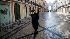 FILE PHOTO: A man waks in downtown Lisbon on the first day of the second national lockdown due to the coronavirus disease (COVID-19) pandemic in Lisbon, Portugal, January 15, 2021. REUTERS/Pedro Nunes/File Photo