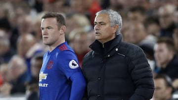 Rooney junto a Mourinho. 