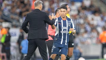 Monterrey�s Johan Rojas (R) celebrates scoring his team's second goal during the Mexican Apertura tournament football match between Monterrey and Queretaro at BBVA Bancomer stadium in Monterrey, Mexico, on July 20, 2024. (Photo by Julio Cesar AGUILAR / AFP)