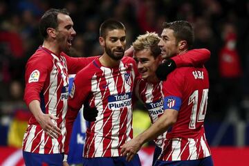 Antoine Griezmann celebrates scoring the team's second goal with Gabi Fernandez, Yannick Carrasco and Diego Godin.