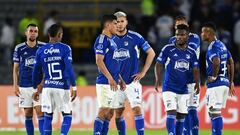 Millonarios' players react at the end of the Copa Sudamericana group stage first leg football match between Colombia's Millonarios and Brazil's America Mineiro, at El Campin stadium in Bogota, on May 3, 2023. (Photo by Raul ARBOLEDA / AFP)