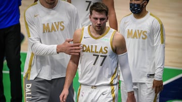 Jan 1, 2021; Dallas, Texas, USA; Dallas Mavericks guard Luka Doncic (77) walks off the floor at the end of the second quarter against the Miami Heat at the American Airlines Center. Mandatory Credit: Jerome Miron-USA TODAY Sports