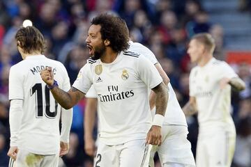 Real Madrid's Brazilian defender Marcelo celebrates his goal during the Spanish league football match between FC Barcelona and Real Madrid CF at the Camp Nou stadium in Barcelona on October 28, 2018. 