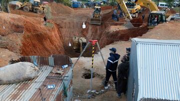 Moroccan authorities and firefighters work to get five-year-old child Rayan out of a well into which he fell after 48 hours earlier, on February 3, 2022 in the region of Chefchaouen near the city of Bab Berred. (Photo by AFP)