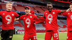 MUNICH, GERMANY - MAY 08: (L-R) Ron-Thorben Hoffmann, Marc Roca, Tanguy Nianzou, Joshua Kimmich, Manuel Neuer and Javi Martinez of Bayern Muenchen celebrate winning the league title after the Bundesliga match between FC Bayern Muenchen and Borussia Moench