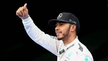 Hamilton blazes to pole and sets new lap record at Sepang