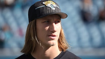 Trevor Lawrence, #16 of the Jacksonville Jaguars, looks on before a game against the Carolina Panthers