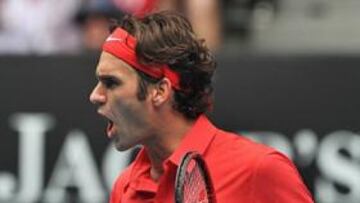 Federer salva el escollo de Karlovic y estará en octavos