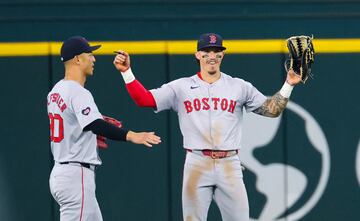 Aug 4, 2024; Arlington, Texas, USA; Boston Red Sox center fielder Jarren Duran (16) celebrates with Boston Red Sox left fielder Rob Refsnyder (30) after the game against the Texas Rangers at Globe Life Field. Mandatory Credit: Kevin Jairaj-USA TODAY Sports