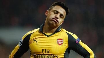 Arsenal's Chilean striker Alexis Sanchez reacts during the UEFA Champions League round of sixteen football match between FC Bayern Munich and Arsenal in Munich, southern Germany, on February 15, 2017. / AFP PHOTO / Odd ANDERSEN