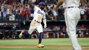 ARLINGTON, TEXAS - OCTOBER 27: Adolis Garc�a #53 of the Texas Rangers celebrates as he rounds the bases after hitting a home run in the 11th inning to beat the Arizona Diamondbacks 6-5 in Game One of the World Series at Globe Life Field on October 27, 2023 in Arlington, Texas. Jamie Squire/Getty Images/AFP (Photo by JAMIE SQUIRE / GETTY IMAGES NORTH AMERICA / Getty Images via AFP)
