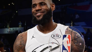 LOS ANGELES, CA - FEBRUARY 18: LeBron James #23 hoists the All-Star Game MVP trophy during the NBA All-Star Game 2018 at Staples Center on February 18, 2018 in Los Angeles, California.   Kevork Djansezian/Getty Images/AFP
 == FOR NEWSPAPERS, INTERNET, TELCOS &amp; TELEVISION USE ONLY ==