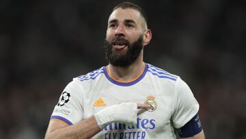 MADRID, SPAIN - MARCH 09: Karim Benzema of Real Madrid CF celebrates scoring their third goal during the UEFA Champions League Round Of Sixteen Leg Two match between Real Madrid and Paris Saint-Germain at Estadio Santiago Bernabeu on March 09, 2022 in Mad