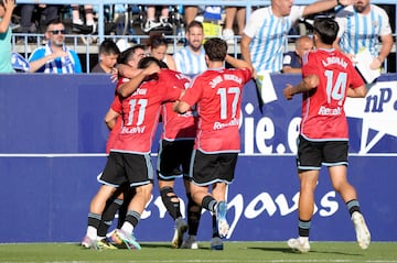 Los jugadores del Celta festejan el gol de Alfon.