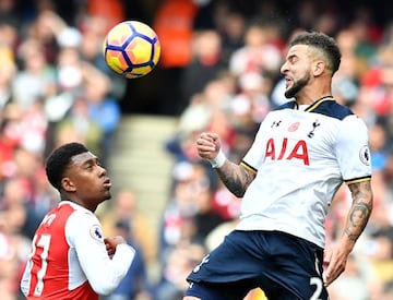 Alex Iwobi vies with Tottenham Hotspur's English defender Kyle Walker