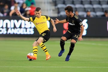 Christian Pulisic (left) in action in a friendly in Los Angeles last week.