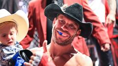 LAS VEGAS, NEVADA - JULY 02: Donald Cerrone and son exit the Octagon during the UFC 276 event at T-Mobile Arena on July 02, 2022 in Las Vegas, Nevada.   Carmen Mandato/Getty Images/AFP
== FOR NEWSPAPERS, INTERNET, TELCOS & TELEVISION USE ONLY ==