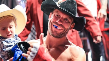 LAS VEGAS, NEVADA - JULY 02: Donald Cerrone and son exit the Octagon during the UFC 276 event at T-Mobile Arena on July 02, 2022 in Las Vegas, Nevada.   Carmen Mandato/Getty Images/AFP
== FOR NEWSPAPERS, INTERNET, TELCOS & TELEVISION USE ONLY ==