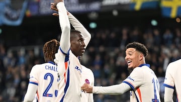 Chelsea's Senegalese striker #15 Nicolas Jackson (C) celebrates with his arms up after scoring the 0-4 goal during the UEFA Conference League semi-final football match Djurgardens IF vs Chelsea FC at the 3Arena in Stockholm, Sweden, on May 1, 2025. (Photo by Jonathan NACKSTRAND / AFP)