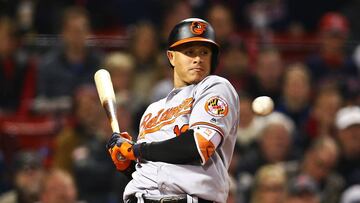 BOSTON, MA - MAY 01: Manny Machado #13 of the Baltmore Orioles dodges a high pitch in the fourth inning of a game against the Boston Red Sox at Fenway Park on May 1, 2017 in Boston, Massachusetts. Adam Glanzman/Getty Images/AFP
== FOR NEWSPAPERS, INTERNET, TELCOS & TELEVISION USE ONLY ==