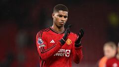 Manchester United's English striker #10 Marcus Rashford applauds fans on the pitch after the English Premier League football match between Manchester United and Bournemouth at Old Trafford in Manchester, north west England, on December 9, 2023. Bournemouth won the game 3-0. (Photo by Oli SCARFF / AFP) / RESTRICTED TO EDITORIAL USE. No use with unauthorized audio, video, data, fixture lists, club/league logos or 'live' services. Online in-match use limited to 120 images. An additional 40 images may be used in extra time. No video emulation. Social media in-match use limited to 120 images. An additional 40 images may be used in extra time. No use in betting publications, games or single club/league/player publications. / 