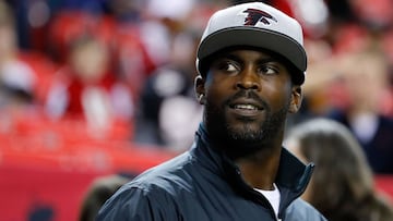 ATLANTA, GA - JANUARY 01: Former Atlanta Falcons player Michael Vick walks on the field prior to the game against the New Orleans Saints at the Georgia Dome on January 1, 2017 in Atlanta, Georgia. (Photo by Kevin C.  Cox/Getty Images)