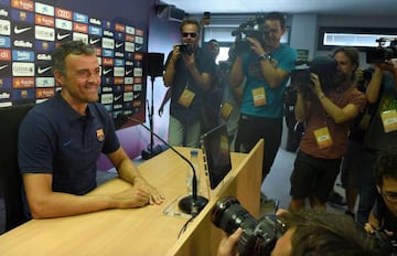 Luis Enrique (left) poses before Thursday's press conference.