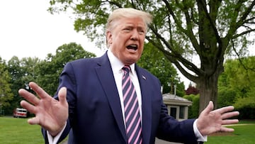 FILE PHOTO: U.S. President Donald Trump speaks to reporters as he departs on travel to Phoenix, Arizona from the South Lawn of the White House in Washington, U.S., May 5, 2020. REUTERS/Kevin Lamarque/File Photo