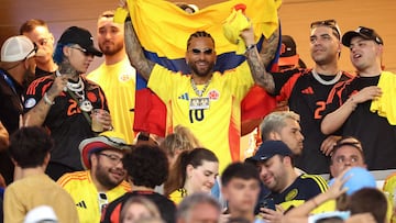 Colombian singer Maluma (C) smiles ahead of the Conmebol 2024 Copa America tournament final football match between Argentina and Colombia at the Hard Rock Stadium, in Miami, Florida on July 14, 2024. (Photo by CHARLY TRIBALLEAU / AFP)