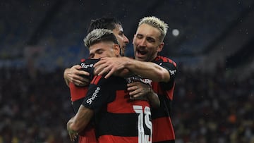 RIO DE JANEIRO, BRAZIL - MARCH 11: Jorge Carrascal of Flamengo celebrates with teammates Erick Pulgar and Léo Ortiz after scoring the second goal of his team during the match between Flamengo and Cruzeiro as part of Brasileirao 2026 at Maracana Stadium on March 11, 2026 in Rio de Janeiro, Brazil. (Photo by Wagner Meier/Getty Images)