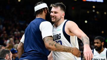 OKLAHOMA CITY, OKLAHOMA - MAY 15: Luka Doncic #77 of the Dallas Mavericks is greeted by teammates on the bench during the fourth quarter in Game Five of the Western Conference Second Round Playoffs against the Oklahoma City Thunder at Paycom Center on May 15, 2024, in Oklahoma City, Oklahoma. NOTE TO USER: User expressly acknowledges and agrees that, by downloading and or using this photograph, User is consenting to the terms and conditions of the Getty Images License Agreement. Joshua Gateley/Getty Images/AFP (Photo by Joshua Gateley / GETTY IMAGES NORTH AMERICA / Getty Images via AFP)
