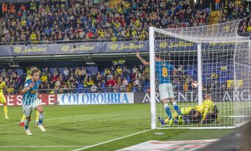 El balón despejado por el portero Asenjo acaba en el remate de cabeza de Filipe Luis que supuso el 0-1 para los madrileños.