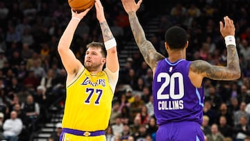 Luka Doncic #77 of the Los Angeles Lakers shoots over John Collins #20 of the Utah Jazz during the second half of a game at Delta Center on February 12, 2025 in Salt Lake City, Utah.