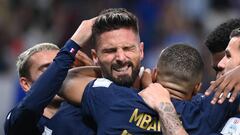France's forward #09 Olivier Giroud (L) celebrates with teammates after he scored France's fourth goal during the Qatar 2022 World Cup Group D football match between France and Australia at the Al-Janoub Stadium in Al-Wakrah, south of Doha on November 22, 2022. (Photo by FRANCK FIFE / AFP) (Photo by FRANCK FIFE/AFP via Getty Images)