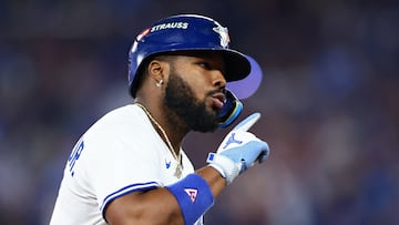 TORONTO, ONTARIO - OCTOBER 19: Vladimir Guerrero Jr. #27 of the Toronto Blue Jays rounds the bases after hitting a home run against the Seattle Mariners during the fifth inning in game six of the American League Championship Series at Rogers Centre on October 19, 2025 in Toronto, Ontario. Vaughn Ridley/Getty Images/AFP (Photo by Vaughn Ridley / GETTY IMAGES NORTH AMERICA / Getty Images via AFP)