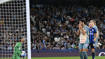 Inter Milan keep Erling Haaland quiet to secure a point against Pep Guardiola’s Premier League leaders in Manchester.