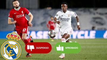 Vinicius corre en paralelo ante Philips en el Real Madrid-Liverpool de ida de cuartos de final de la Champions.